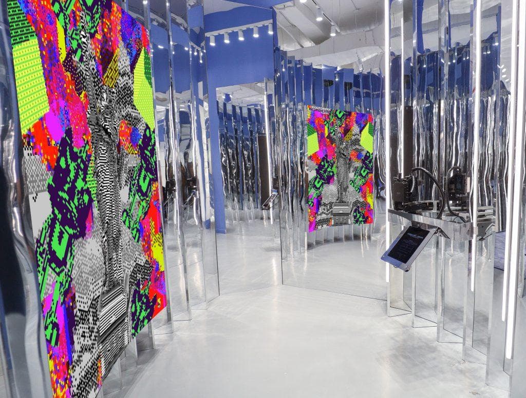 Ferragamo Soho NFT — A mirrored room where a video wall reveals custom NFTs, captured live from an iPad + camera rig.